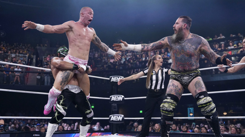 Bandido and King double teaming on Fletcher
