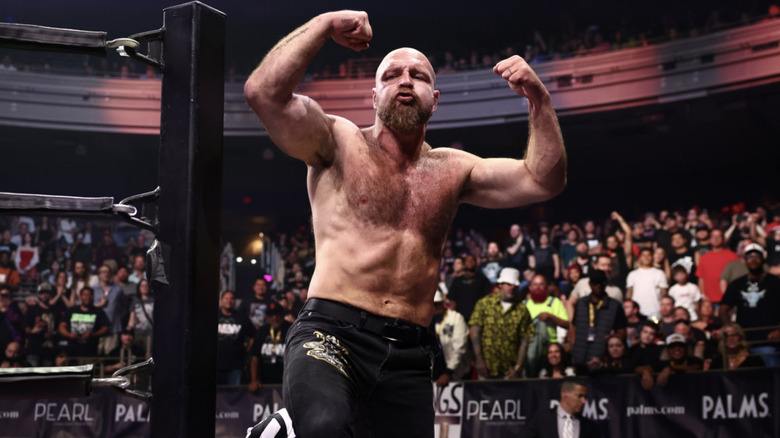 Moxley flexing his biceps