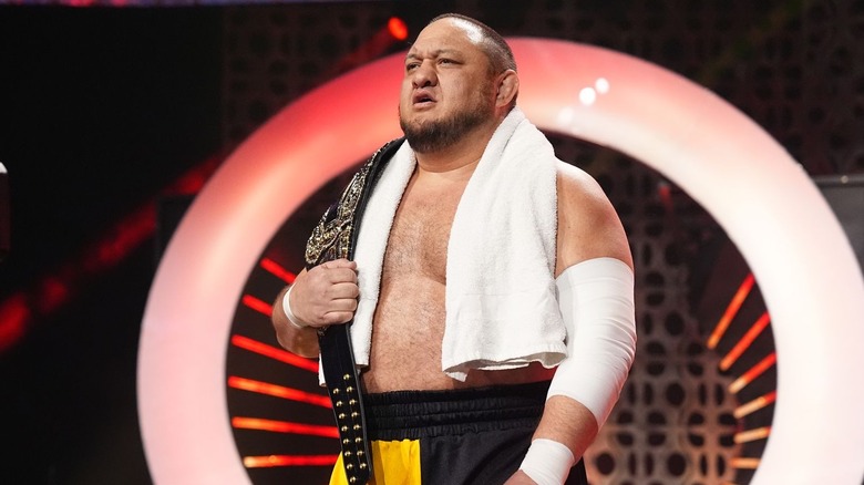 Samoa Joe walking to the ring as AEW World Champion