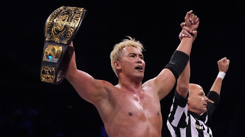 Kazuchika Okada celebrates with the AEW Continental Title