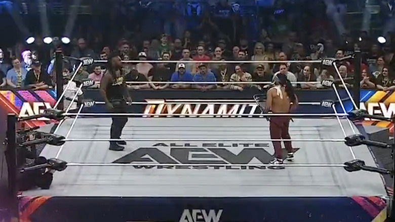 Strickland and Bandido staring one another down inside the ring