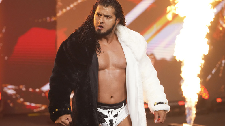 Rush makes his way down to the ring for a match, his entrance fire pyro going off behind him, during an episode of "AEW Collision."