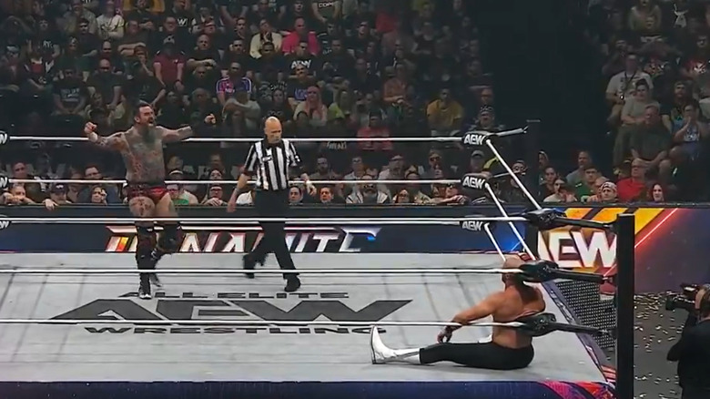 Brody King sets up for a cannonball on Claudio Castagnoli