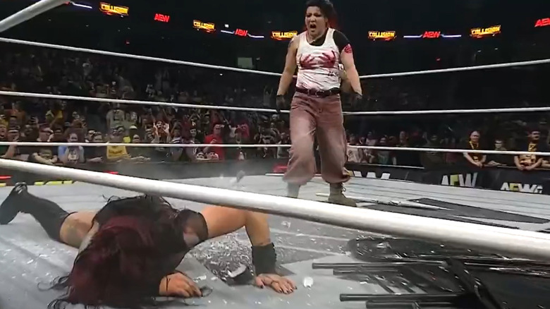 Hikaru Shida hits Kris Statlander with light tubes