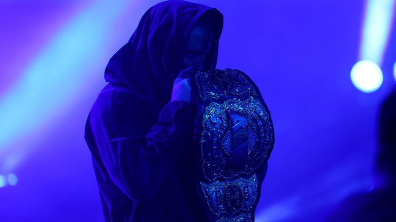 Darby Allin holds up the AEW World Championship on "AEW Collision"
