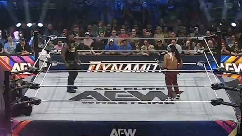 Strickland and Bandido staring one another down inside the ring