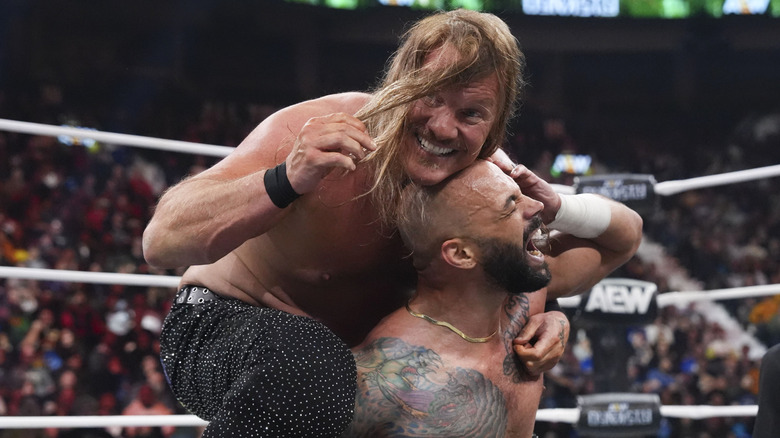 Chris Jericho puts Ricochet in a hold during their match at AEW Dynasty 2026.