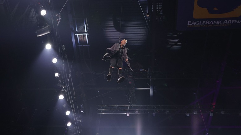 Darby Allin descends into the arena.