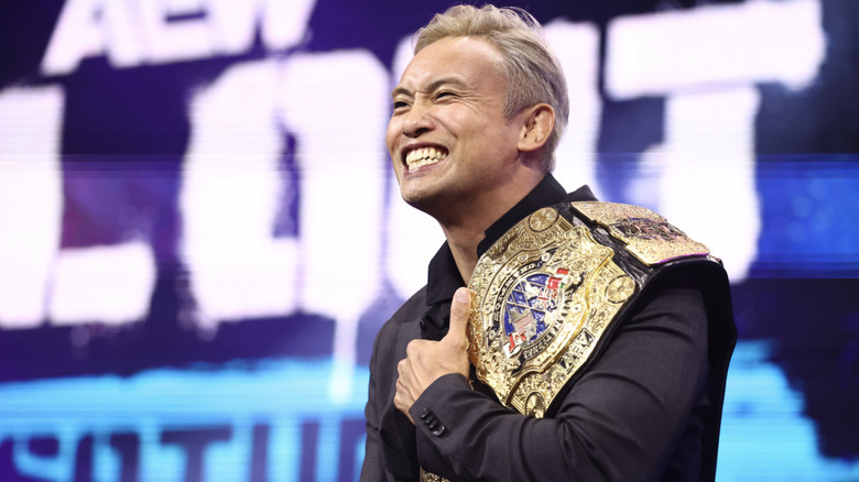 Okada smiling on the entrance ramp with his International Championship