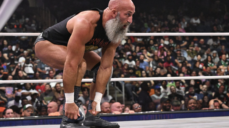 Ciampa lacing up his boot