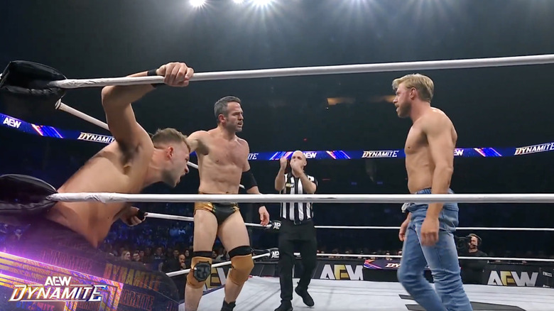 Cassidy and Strong in the corner with Connors