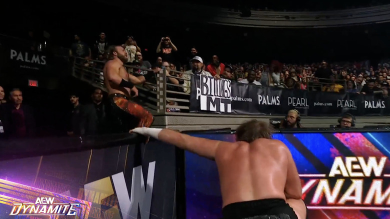 Page and Davis in the ringside area