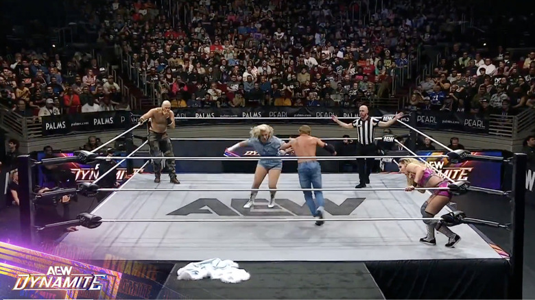 All four competitors in the ring