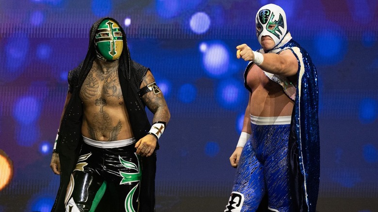 Templario and Atlantis Jr. walking to the ring