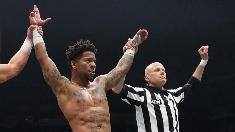 Lio Rush getting his hand raised