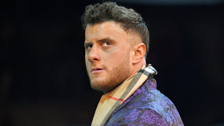 MJF smirking, pondering