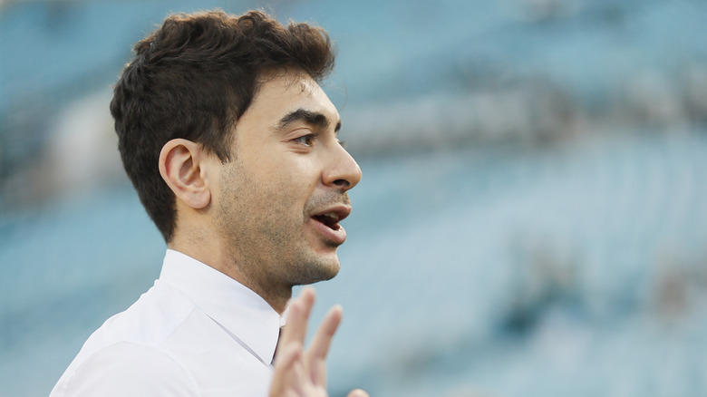 Tony Khan holds up a hand