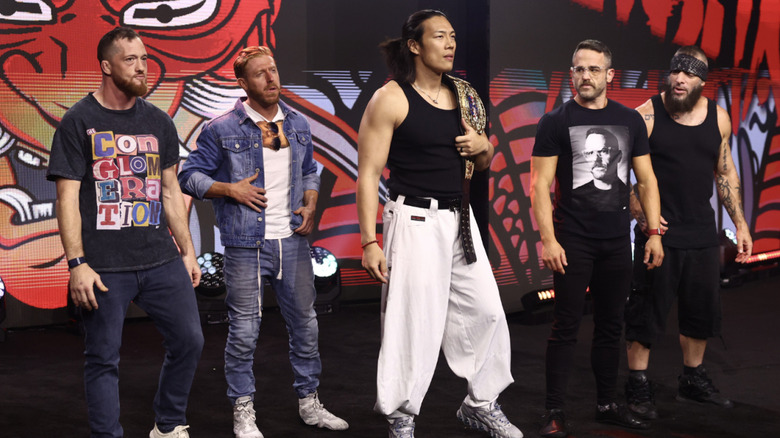 O'Reilly, Cassidy, Takeshita, Strong, and Briscoe standing on the entrance ramp