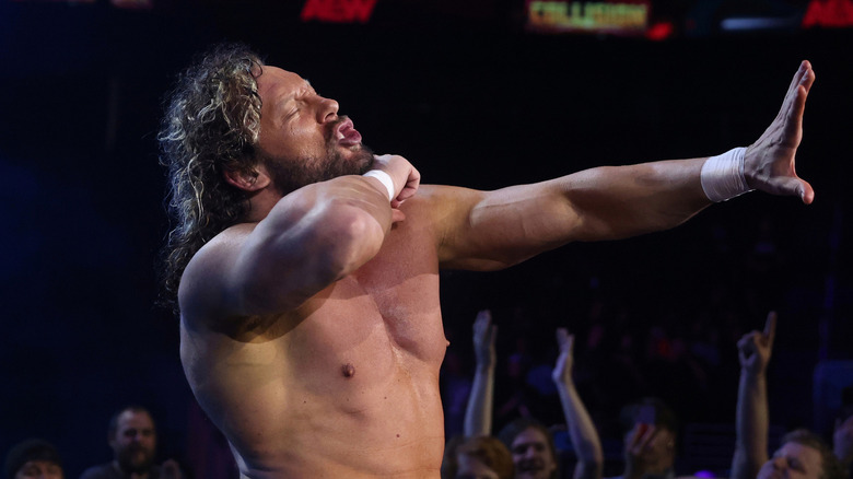 Kenny Omega posing