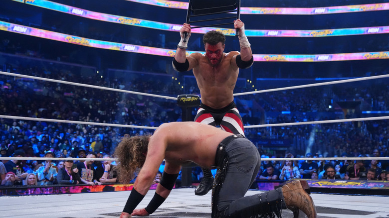 MJF hits Adam Page with a chair