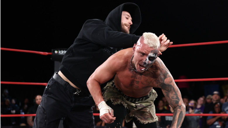 Kidd attacking Allin from behind