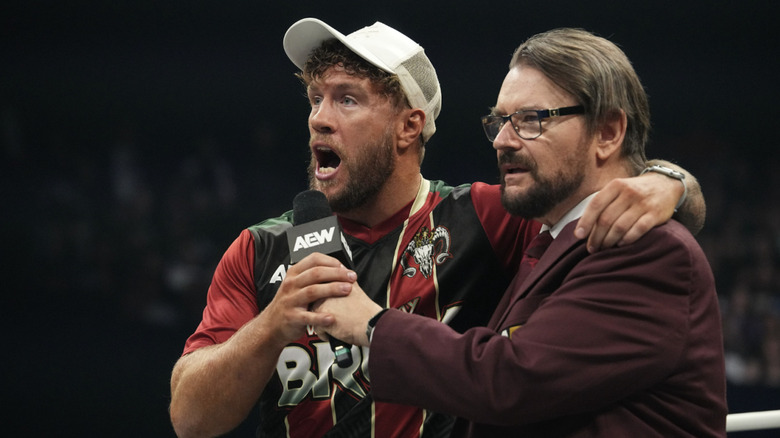 Ospreay speaking with Tony Schiavone in the ring