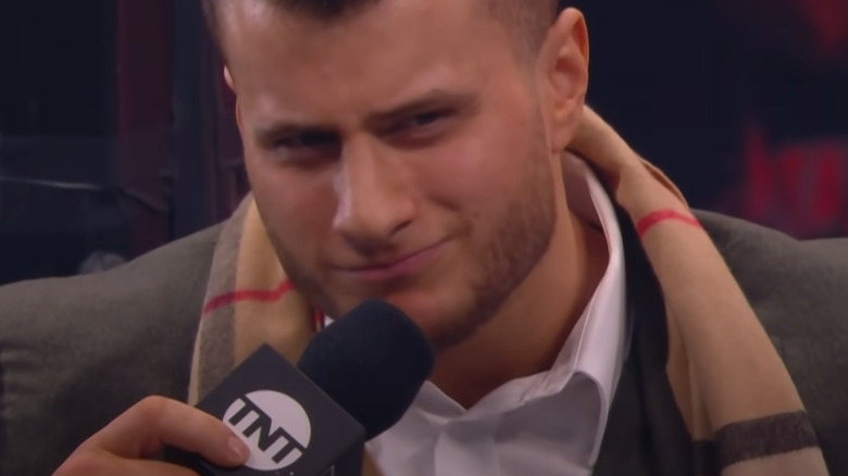 MJF talking into microphone