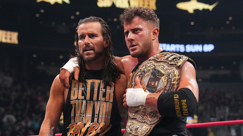 MJF putting his arm around Adam Cole