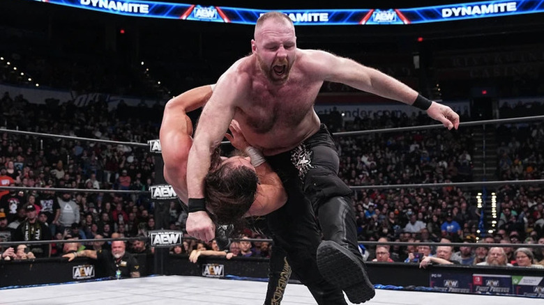 Jon Moxley clotheslines Jay White