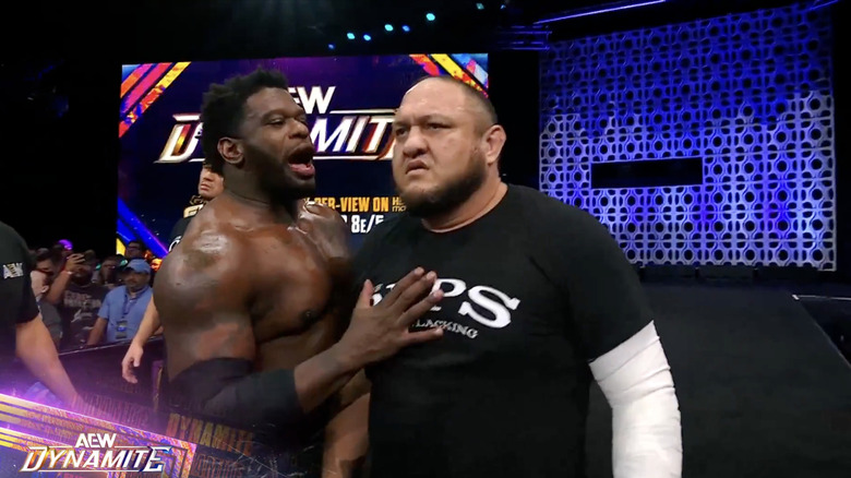 Hobbs holding Joe back