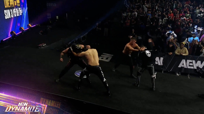 Several competitors brawling on the entrance ramp