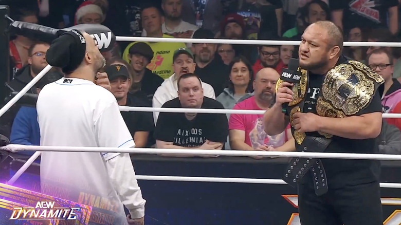 Kingston and Joe speaking in the ring