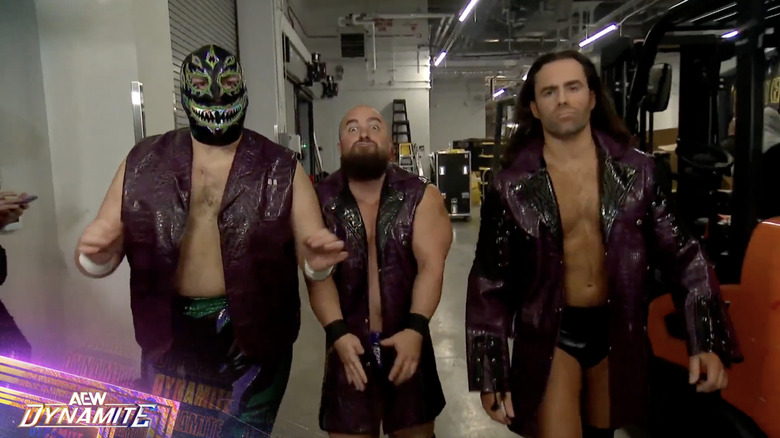 Dark Order walking around backstage