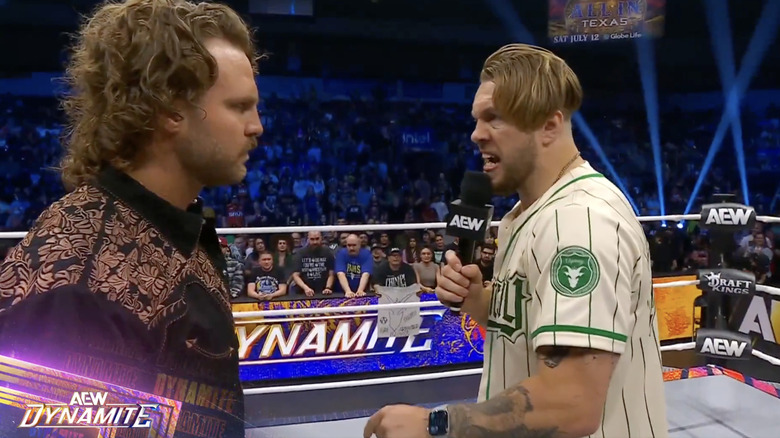 Ospreay and Page speaking in the ring