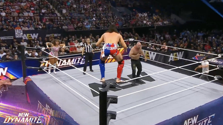 Several competitors inside the ring