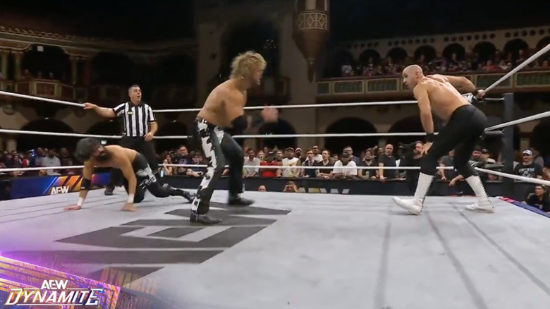 Yuta, Page, and Castagnoli in the ring