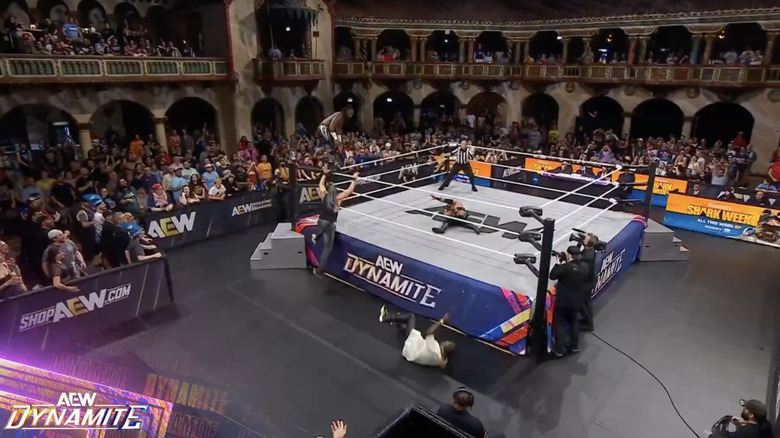 Nana, Archer, Strickland, and Hechicero at ringside
