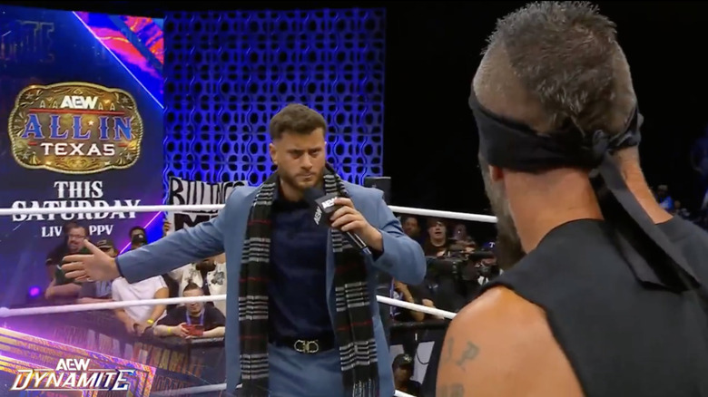 MJF and Mark speaking in the ring