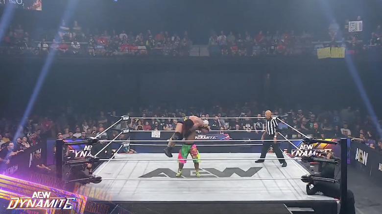 Takahashi with Alexander up on his shoulders