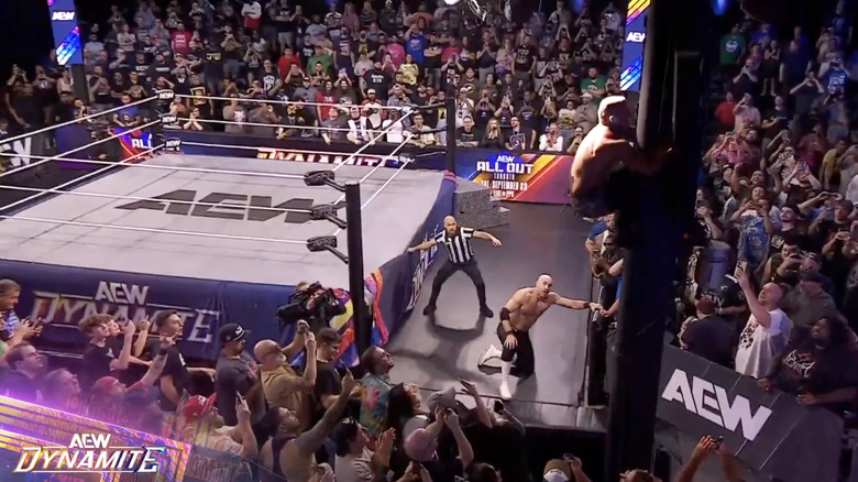 Allin climbing up the pole