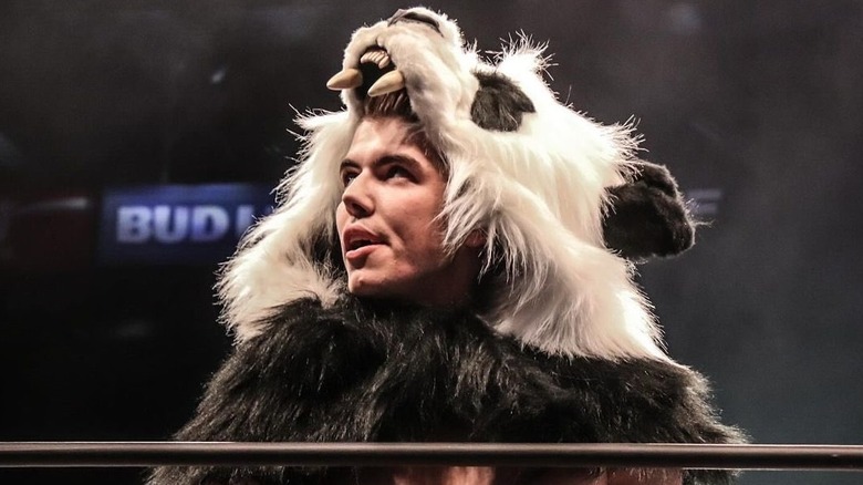 AEW/ROH star Sammy Guevara (with his Panda head) look out towards the crowd ahead of his first-ever AEW match