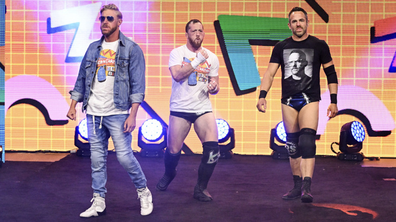 Cassidy, O'Reilly, and Strong standing on the entrance ramp