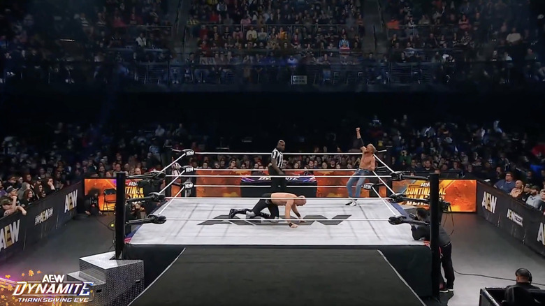 Cassidy setting up for the Orange Punch on Castagnoli