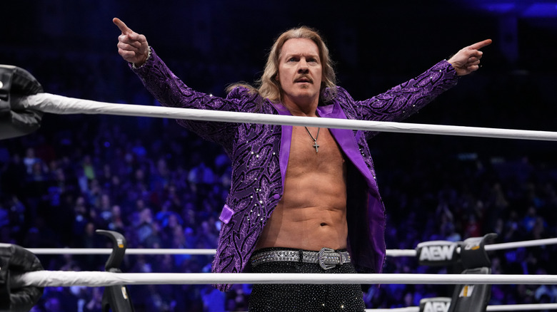 Chris Jericho poses in the ring upon his return to 