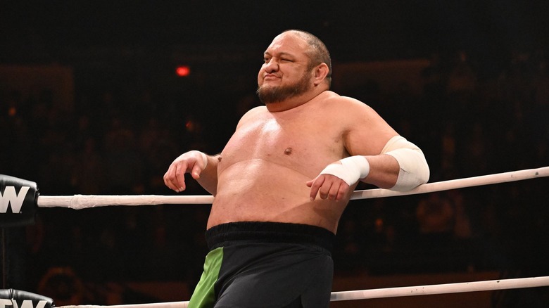 Samoa Joe leans on the ropes
