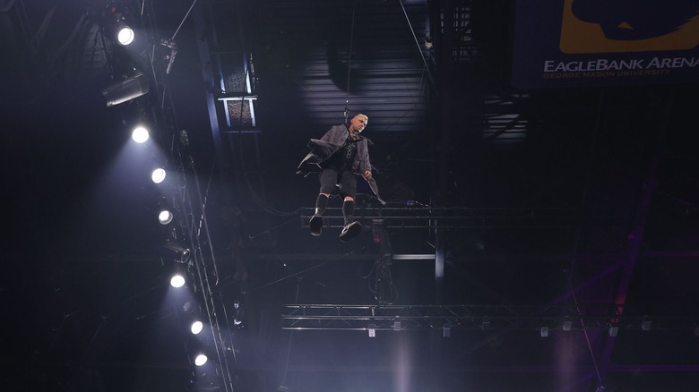 Darby Allin descends into the arena.