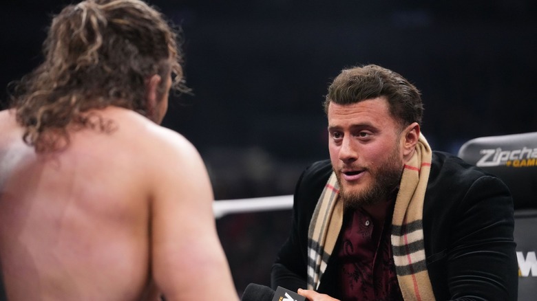 Kenny Omega and MJF at a contract signing