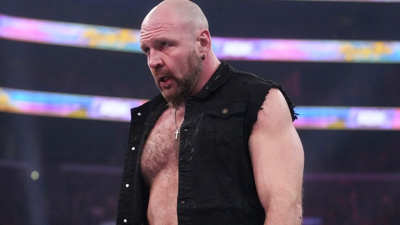 Jon Moxley wearing a black vest