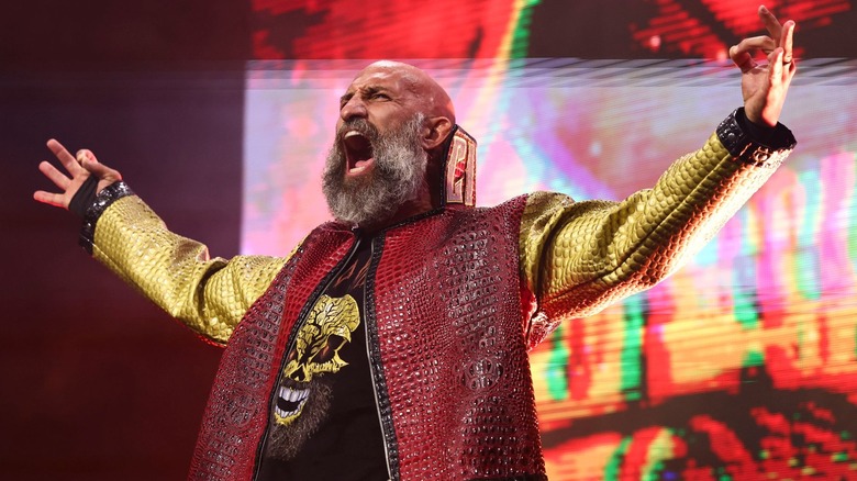 Tommaso Ciampa wearing a red ring jacket