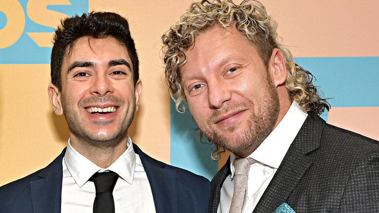 Tony Khan and Kenny Omega smiling